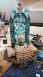 This may contain: a sculpture is sitting on top of a table