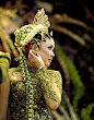 The bride by Alfonso T  A woman in traditional Javanese bride costume.