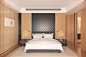 【卧室】：床头两边的圆形壁灯打破了空间内横平竖直的线条约束。