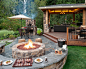 Traditional patio idea in Portland with a fire pit and a gazebo