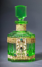 Czechoslovakian perfume bottle, circa 1920s, in green crystal, with jeweled and…: 