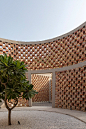 brick perforations and projections characterize a house in new delhi designed by RLDA