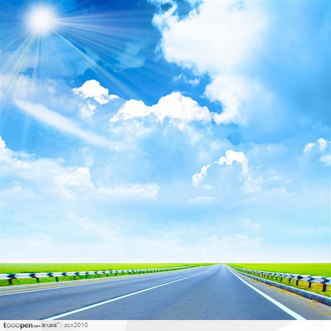 天空公路-阳光照射下的清澈的蓝天白云和高...