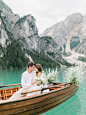 A breathtaking elopement shoot at Lake Braies in the Dolomites | Italy Elopement : Inspired by the breathtaking scenery of Lake Braies nested in between the dramatic mountain peaks of the Italian Dolomites, this dreamy editorial planned by Swiss wedding p