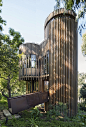 This contemporary treehouse-inspired cabin is a playful composition between squares and circles! - Yanko Design : If you’re ever in the lush forests of Cape Town, you may come across four cylindrical towers, that kind of resembles a treehouse! This contem