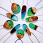 Jeweler Britta Boeckmann doesn't have a plan when she designs her wood-fragment and resin accessories. Instead, she uses the natural form of the wood fragments to define the shape, fusing them with colored and sometimes glow-in-the-dark resin to make her 