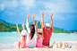 Happy beautiful family on the beach