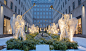 Light sculptures of heralding angels in front of the Rockefeller Center Channel Gardens in New York City, United States of America.