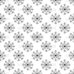 冬天用雪花手绘无缝图案。矢量图