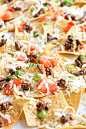 Bulgogi Nachos (gluten free soy free)- Korean BBQ beef with crispy nachos cheese chips.