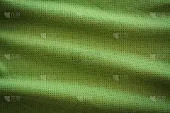 皱巴巴的绿色织物纹理背景