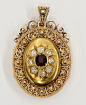 Garnet diamond yellow gold locket pendant enamel