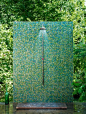 outdoor shower with green tile: 