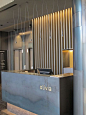 The brass name on the reception desk is a really interesting and design led way to brand