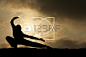 martial arts man silhouette on dramatic sky background