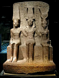 King Ramses II (1279-1213 BC) with the God Amun and Mut God, red granite temple of Amun at Thebes.