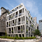 Swollen concrete facades increase floor area inside Archium's Gilmosery office block