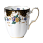 The 1910 Duchess Mug is decorated with yellow and lilac roses and blue blooms accented with 9-karat gold trim throughout.
