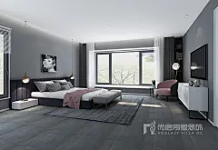 灰色纹理的壁纸作为休憩空间的背景，深咖色的床、粉灰色的单椅，简单的搭配便提升了空间的活跃感与层次感。设计师的设计功底由此可见，举重若轻的设计，诠释着业主举重若轻的生活态度。