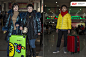 2014年，北京，来自哈尔滨的沈玉和沈杰两姐妹（左）和来自成都的旅客汪帅。新华社记者沈伯韩摄 【流行元素：荧光色羽绒服、个性行李箱】