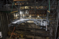 KSC-2015-3642 : In High Bay 3 inside the Vehicle Assembly Building at NASA's Kennedy Space Center in Florida, a 325-ton crane is being used to lift the first half of the K-level work platforms for NASA's Space Launch System &#;40SLS&#;41. The plat