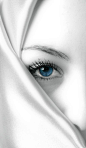 .I have been trying to pick eyes that are either beautiful unusual or seem to want to tell you a story if you look for it. These eyes are beautiful and there is something in her eyes. I feel a story or a deep thought I wish I knew it.: 