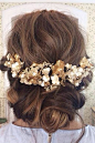 Gorgeous casual updo with flowers: 