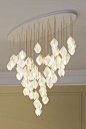 One of the products in Haberdashery's luxury lighting range inspired by the first blooms of spring. Each stylised bud is lit from within creating a soft glow through translucent porcelain petals. The buds are accented in gold with plated fixings and fine 