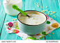 Dinner or breakfast children - milk soup with pasta in the form of numbers and letters. Food for children. Copy space.