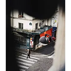 Photo by Andrew in Paris. May be an image of 1 person, umbrella and street.