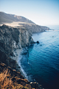 photo of cliff near shore