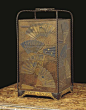 A JAPANESE METAL-MOUNTED AND BROWN LACQUER JUBAKO, 18TH CENTURY, With five compartments decorated sans traverse with fan motifs, with carrying-handle, adapted from a picnic set, 17 in. (43 cm.) high; 8 in. (20 cm.) wide