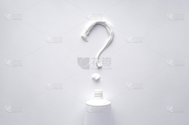 Question mark from toothpaste on a white backgroun