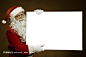 高清圣诞老人拿白板高清设计背景图片素材