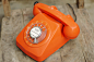 80年代国产桔色塑料机身老式拨盘电话