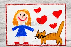 彩色图画照片:微笑的小女孩和她可爱的猫
