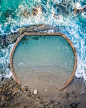 Aerial Images of Vibrant Landscapes by Photographer Niaz Uddin : Niaz Uddin is a photographer, director, and filmmaker that explores a variety of natural landscapes from high above. His color-saturated photographs explore crowded beaches and remote tide p