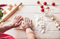 men's hands knead the dough.