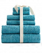 A properly folded towel has a neat, fluffy appearance and hidden edges.    1. Fold towel in thirds lengthwise. (If towel will be hung, transfer to rod; the monogram, if any, will be centered and visible.)    2. Fold towel into a rectangle. Keep sets of gu