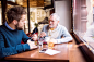 Senior father and his young son in a cafe. by Jozef Polc on 500px