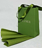 La Mer EMPTY Limited Edition Moss Green Small Paper Gift Bag & 1 sheet of new/unused unbranded tissue paper of matching color. Gift bag received with La Mer skincare purchase, but  it was never carried/used.