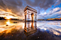 Dramatic sunset on Place de l'Etoile in Paris