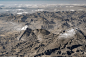 Bowles used a modified Sony Nex 5N camera to capture these  views in a completely different spectrum (pictured: rugged hills in Iran)