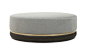 An elegant centrepiece to any seating arrangement, this circular upholstered ottoman is both stylish and sophisticated. The metallic inset trim can be customised to your specifications and instantly adds a subtle element of glamour. Create a luxurious sta