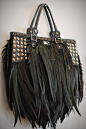 Feather and studded leather bag