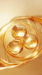 hree golden oil spheres, each emitting soft light and surrounded by fluids waves on the top of an open circular transparent bowl, floating in midair, with a solid color background. The overall composition is symmetrical, presenting a minimalist style. Hig