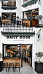 Andreas Petropoulos has recently completed the design of Daily Dose, a small takeaway coffee bar in the city of Kalamata, Greece, that features a white, black and wood interior.