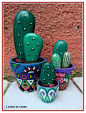 painted rock cacti in painted pots - nice presentation