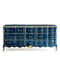 Baroque Dresser The makeover: Metallic gold trim highlights this piece's ladylike curves and elegant detailing, while a coating of masculine navy lacquer (Marine Blue; benjaminmoore.com) keeps the look from veering too matronly.: 