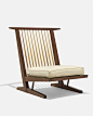 GEORGE NAKASHIMA, Conoid Cushion lounge chair, USA, 1982 . American black walnut and hickory. / Wright: 